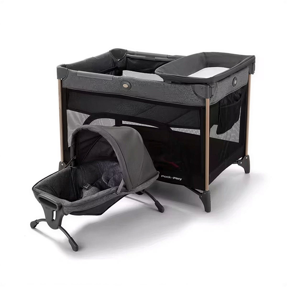 A black and gray portable crib with a black canopy and a black mattress, designed for use with a baby.