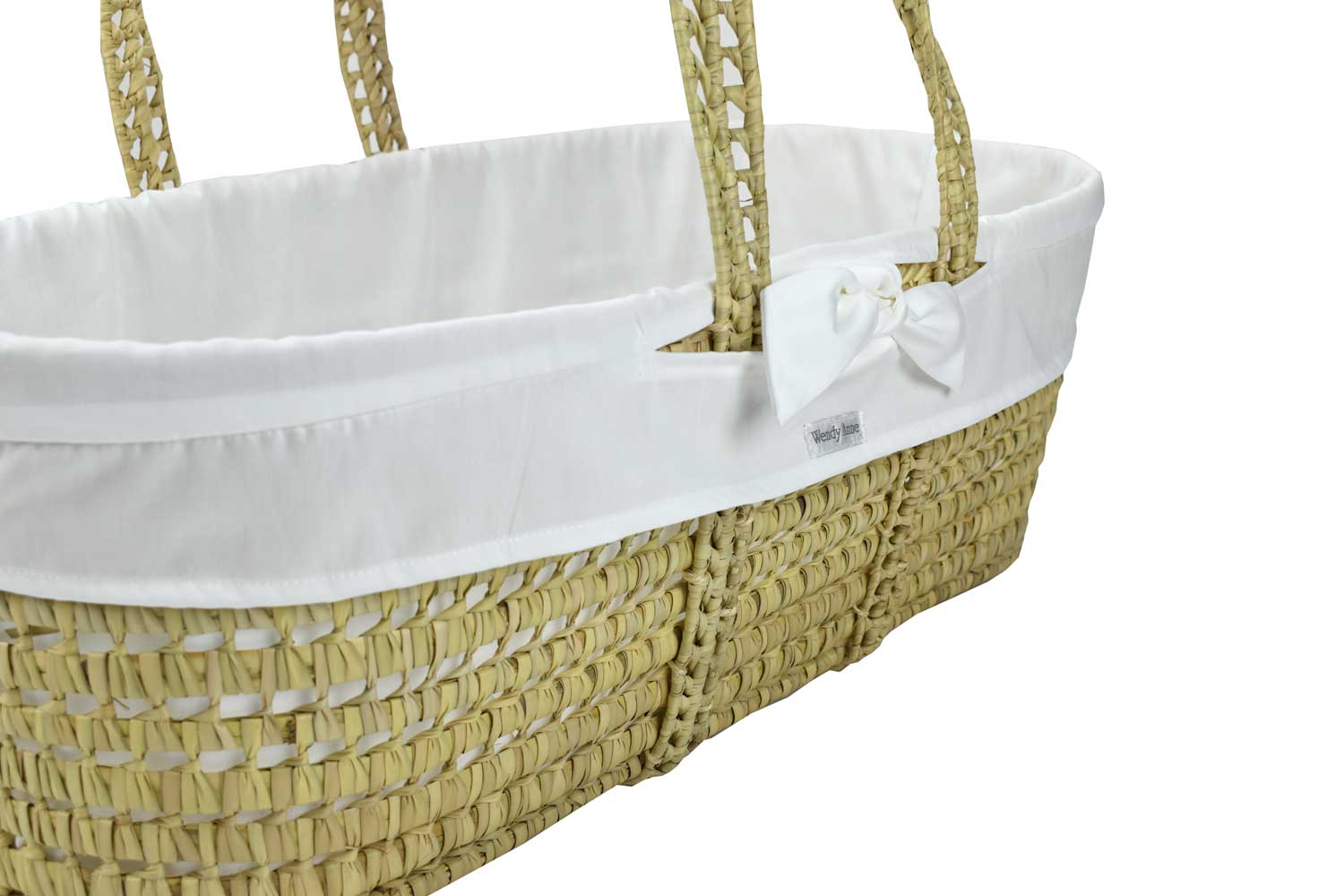 palm leaf Moses basket with white organic cotton fabric over the basket for protection and easy use for new born baby to sleep in.