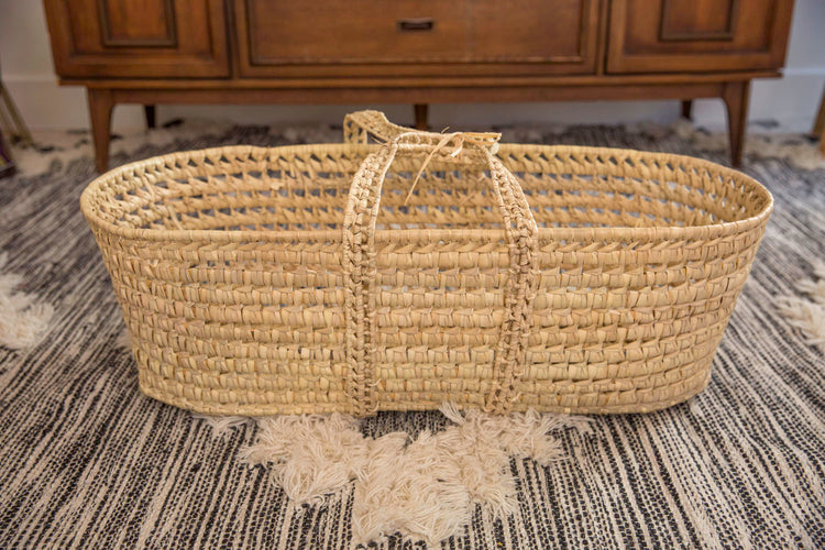 This is a palm leaf Moses basket all natural and handwoven, click her for more options.