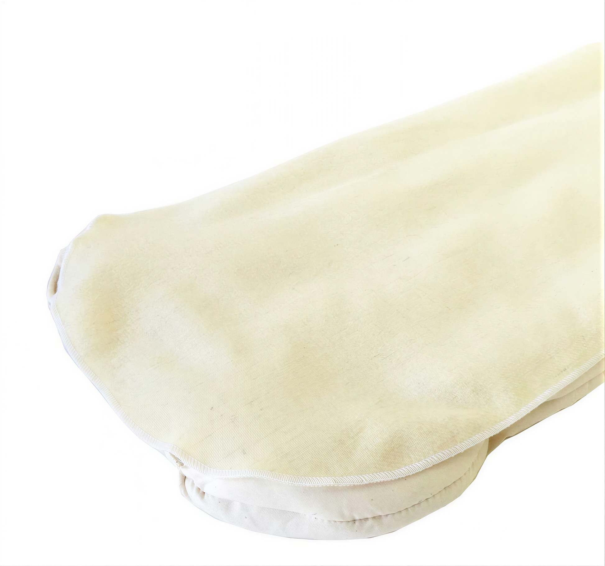 A white cloth or fabric item, possibly a blanket or cushion, is shown in the image.